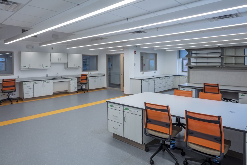 modern university lab space with storage, cabinets, and sitting work space