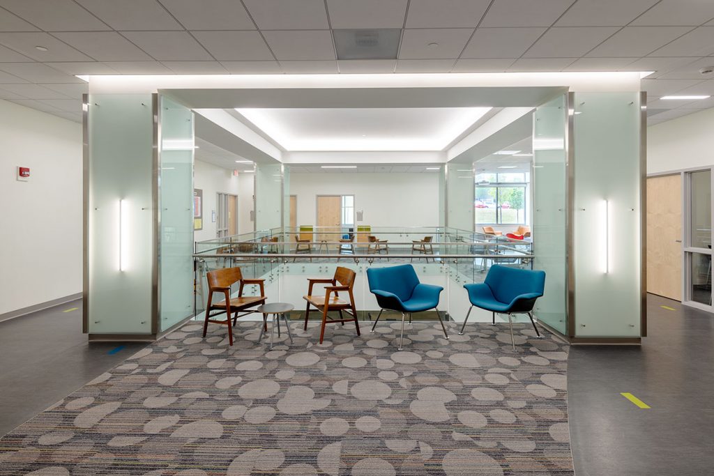 Renovated academic building with new glass stairwell and atrium